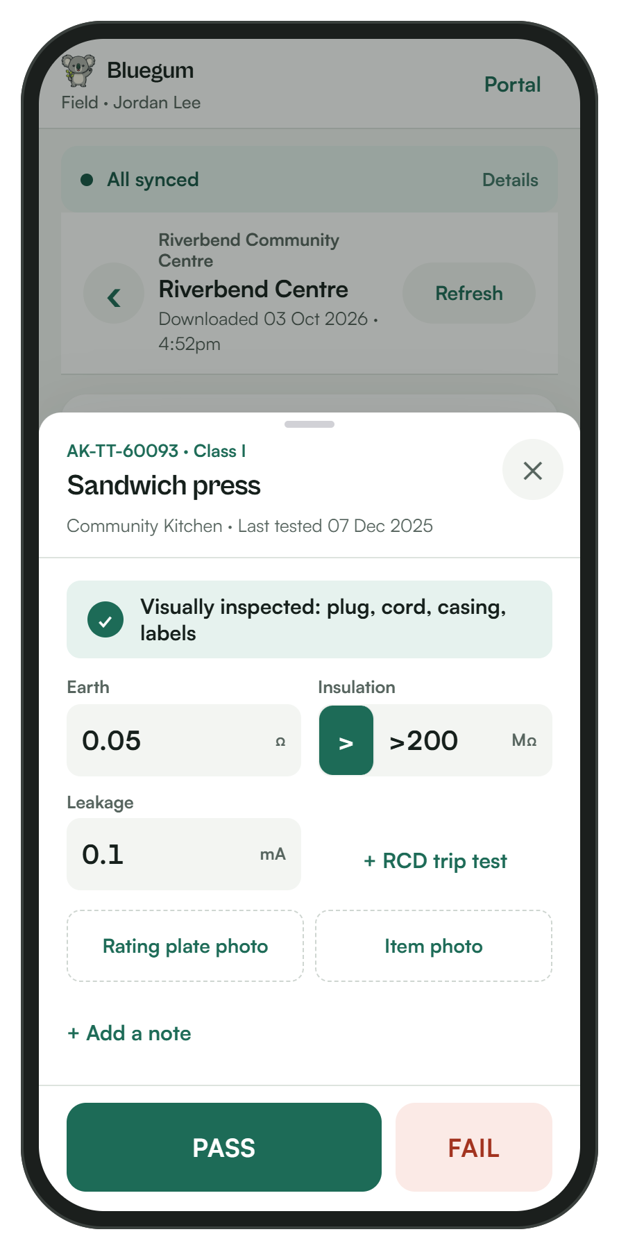 Logging a test in the field app: inspection ticked, readings entered, PASS and FAIL buttons